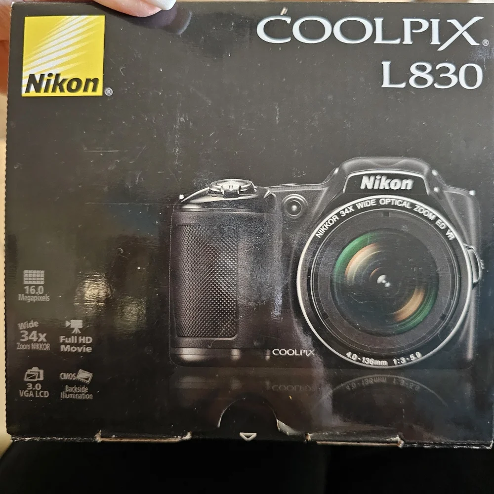 Nikon Coolpix L830 with Case very gently used a few times.